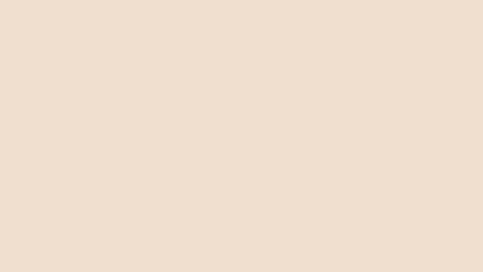 Solid light pink background.